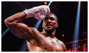 Anthony Joshua survives early knockdowns to knockout Prenga with four minutes