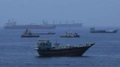 China warns it will safeguard its interests after US widens sanctions against Iran