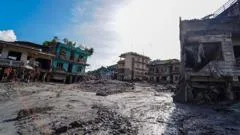 Nepal cracks down on online abuse of flood survivors
