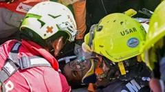 Venezuela quake survivor pulled out alive after eight days