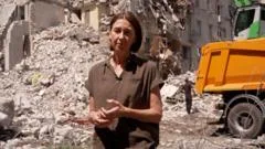 Watch: BBC at site of deadly Russian attack on Kyiv flats