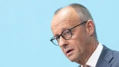 Merz vows to keep coalition together for Germany's 'democratic future'