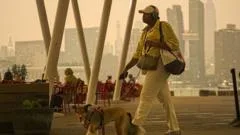 More than 800 Canadian wildfires burning as air quality alerts extend to US