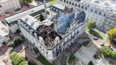Suspect arrested after historic town hall set alight during disorder - French media