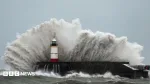 Thousands without power and travel disruption as Storm Austen batters southern UK