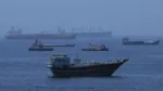 China warns it will safeguard its interests after US widens sanctions against Iran