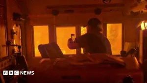 Train 'encased in flames' in Canada wildfire