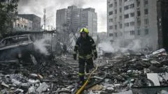 Nine killed in Russian strikes on Kyiv on eve of Nato summit in Turkey