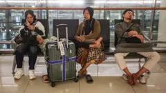 Volcano eruption triggers flight suspensions at Indonesia's main airport
